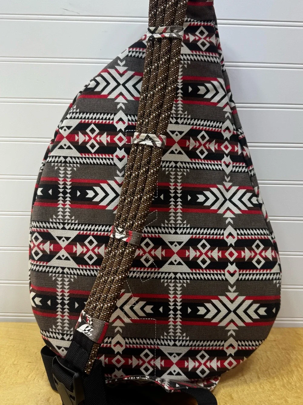 Kavu Tribal/Aztec Rope Sling Bag in Gray/Brown, Red, Cream